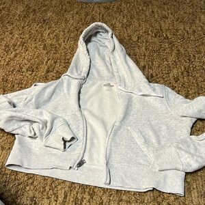 Hollister size large cropped grey zip up